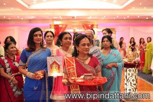 Bride's family inviting the groom to enter at The VIP Lounge in London