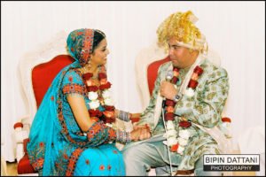 North Indian couple in mandap wedding ceremony