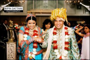happy married indian couple after wedding vows