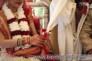the knot tying rite at hindu temple wedding