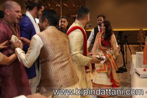 image showing process of stealing the shoes from the groom