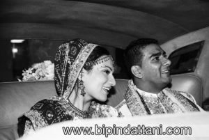 couple in wedding car after vidai indian wedding at Hammermith Novotel