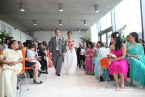 Indian father and bride aisle walk at brent civic centre