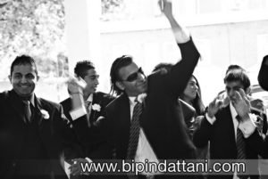 indian wedding groom arrival celebration Image by Bipin Dattani Photography