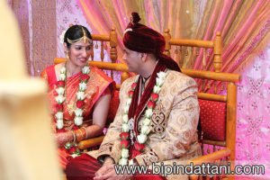 happy indian bride and groom discussing wedding ceremony natural wedding picture