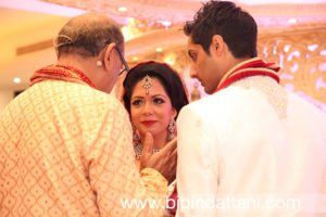 Vasudev Mehta with bride and groom