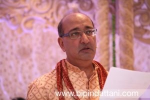 vasudev mehta priest at a hindu wedding