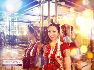 happy bride's portrait by Bipin Dattani the gujarati ceremony wedding photographer