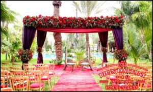 Red flowers mandap setup for indian wedding in Marrakech