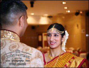 natural candid wedding photography of bride looking at groom
