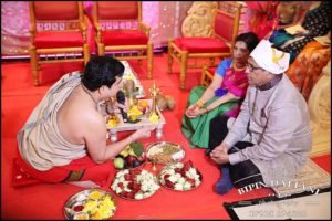 priest with groom parent pre tamil hindu wedding begining