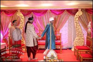 unique grooms entrance at his tamil hindu wedding london