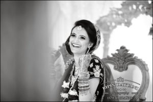 world best Indian wedding photographers candid photo of happy indian bride on her wedding day